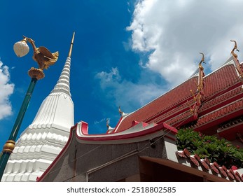 White pagoda and golden swan-shaped lamp post. - Powered by Shutterstock