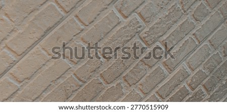 White painted brick wall background with square texture pattern, suitable for interior backdrop, minimalist design, and architectural surface concept.