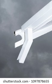 White Painted Downspout And Roof Eave In Houston, Texas During A Hurricane.