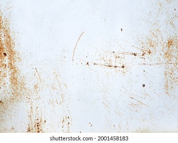 White painted metal texture with with rusty scratches. Rusty metal background.