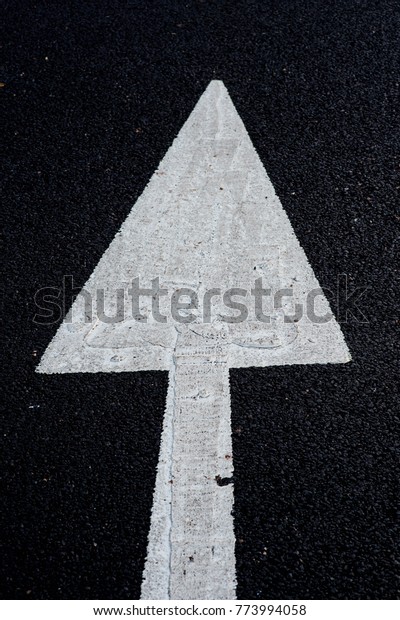 White Painted Road\
Traffic Direction Arrow