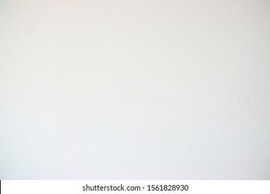 A White Painted Wall With A Fine Egg Shell Texture.