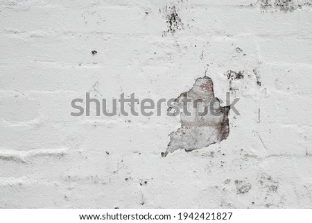 White painted weathered brick wall texture close up