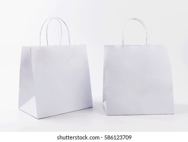 White Paper Bags On White Background.