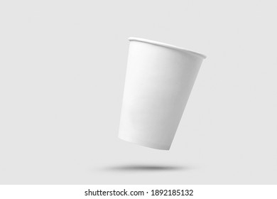 White paper cup of coffee on light grey background.  Flying paper cup on white background. Isolated for mock up - Shutterstock ID 1892185132