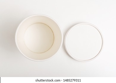 White Paper Cup With Lid On White Background. Empty Paper Cup With Lid Mockup On White Background. Flat Lay. Top View