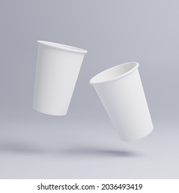 White paper cups of coffee mock up on blank background, Two cups in the air dynamically