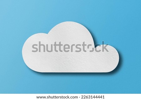 White paper cut out speech bubble shapes set on light blue paper background.
