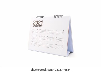 White paper desk spiral calendar 2021 on white background. - Shutterstock ID 1615744534