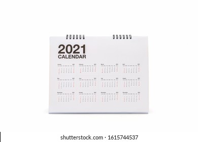 White paper desk spiral calendar 2021 on white background. - Shutterstock ID 1615744537