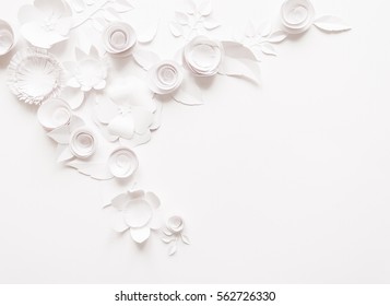 White Paper Flowers On White Background. Cut From Paper.