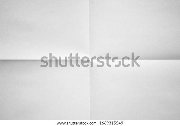 White paper\
folded in four fraction\
background