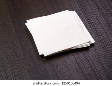 White Paper Napkin On Old Wooden Table