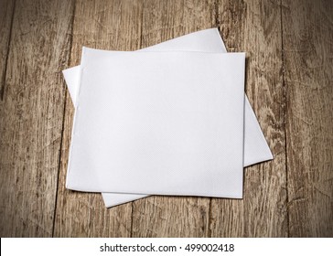 White Paper Napkin On Old Wooden Table