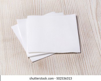 White Paper Napkin On Old Wooden Table