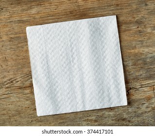 White Paper Napkin On Wooden Table, Top View