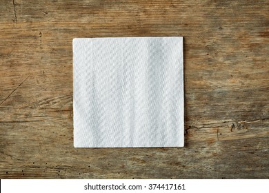 White Paper Napkin On Wooden Table, Top View