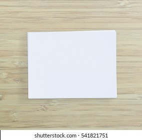 White Paper On Wood Table Of The Background - Shutterstock ID 541821751