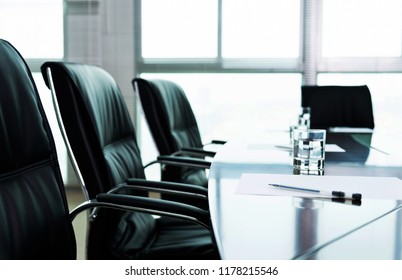 White paper with pen in the meeting room. - Shutterstock ID 1178215546