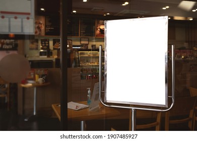 White Paper Poster Mockup Displayed Outside The Building Restaurant. Marketing And Business Concept. 