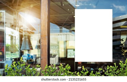 White paper poster mockup displayed outside the building restaurant. Marketing and business concept.  - Shutterstock ID 2135231655