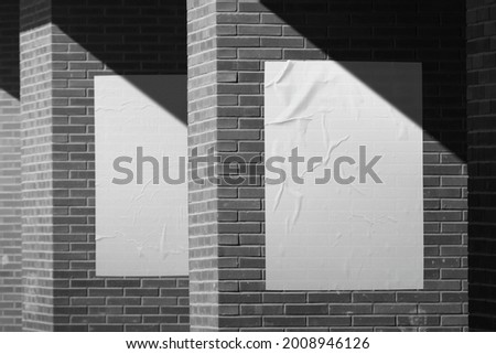 White paper poster mockup. Set of wet wrinkled and creased paper sheets with crumpled texture, blank posters glued to street wall or advertising column, mock up for design