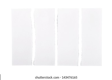 White paper strips torn apart and isolated over a white background
