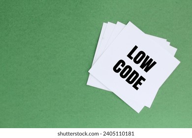 white paper with the words low code. technology concept