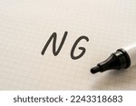White paper written "NG" with a marker.