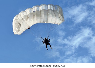 White Parachute On Blue Sky