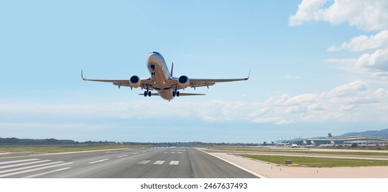 White Passenger plane fly up over take-off runway from airport - Barcelona, Spain - Powered by Shutterstock