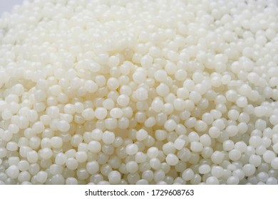 White PET Granules, Polymer Resin, Plastic Granulate For Injection Molding Process. Plastic Pellets. Biodegradable Plastic Pellets.