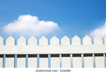 White Picket Fence And Sky
