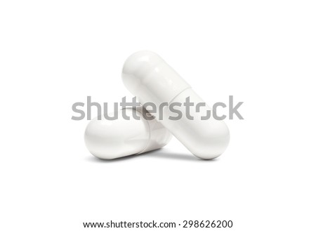 white pill capsule isolated on white background