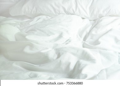 White Pillow On Bed And With Wrinkle Messy Blanket In Bedroom, From Sleeping In A Long Night Winter.