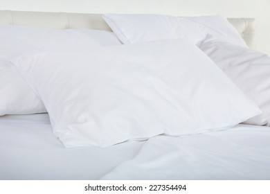 White Pillows On Bed Close Up