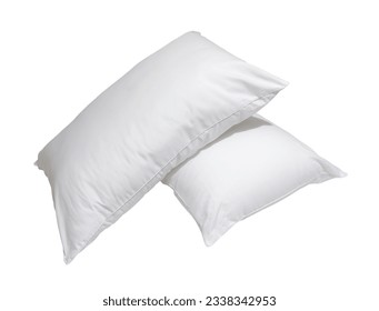 White pillows in stack in hotel or resort room are isolated on white background with clipping path. Concept of confortable and happy sleep in daily life