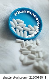 White pills close-up on a blue-white background. close-up, pharmacovigilance, safety quality control