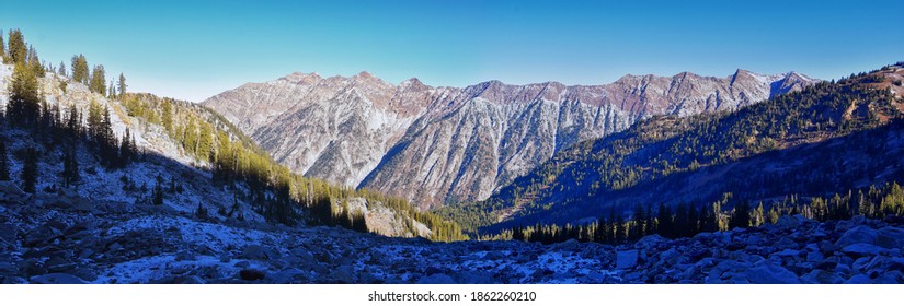 White Pine Lake views from trail mountain landscape towards Salt Lake Valley in Little Cottonwood Canyon, Wasatch Rocky mountain Range, Utah, United States. 