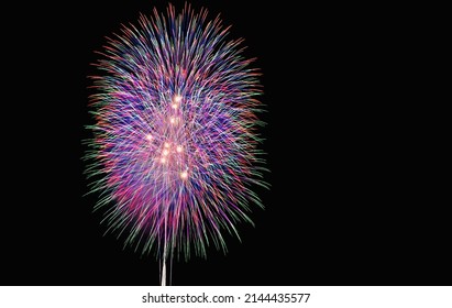 White, Pink, Green Fireworks At Night