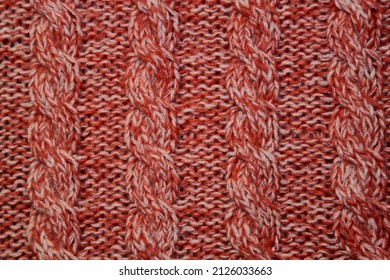 White and pink knitting texture background. Selective focus, abstract. High quality photo