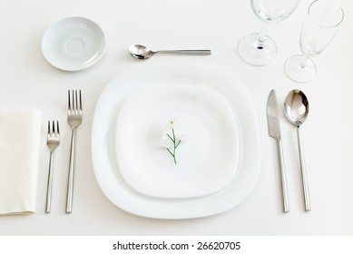 White Place Setting With Little Flower