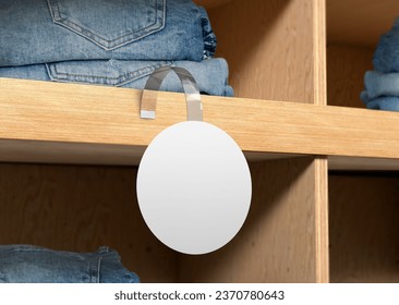 white plain empty blank round branding store shelve wobbler label on wooden counter