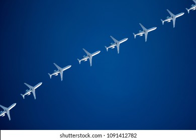 white planes in blue sky pattern