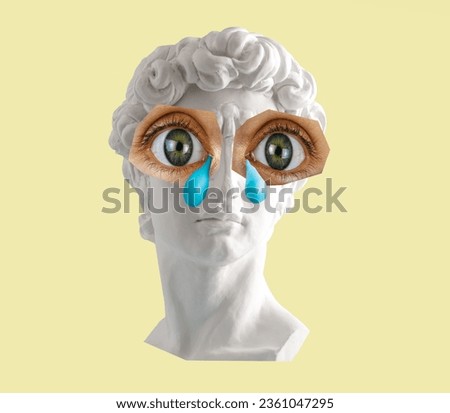 White plaster statue head of David with big eyes and tears on yellow background. Minimal art poster.