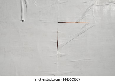 White Plastered Glued Poster Wall