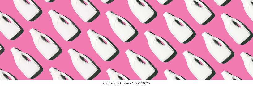 White Plastic Bottle Of Cleaning Product, Household Chemicals Or Liquid Laundry Detergent On Pink Background. Creative Design For Packaging. Top View. Flat Lay. Copy Space. Detergent Bottle Pattern.