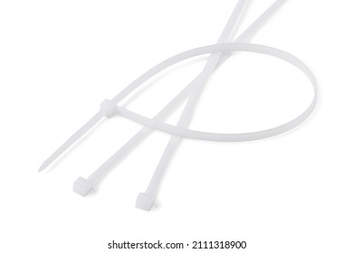 White plastic cable ties isolated on a white background - Shutterstock ID 2111318900