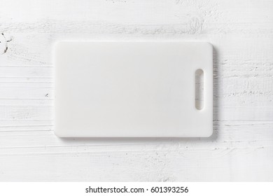 White Plastic Cutting Board On Table, Top View