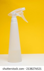 White Plastic Pulverizer On A Yellow Background